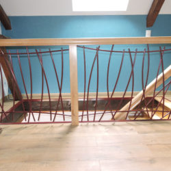 Escalier limon central, garde corps en fer forge, rambarde, balustrade en fer forgé, escalier fer forge chene, ferronnier, ferronnerie Pau, Angais, 64, orthez, Tarbes